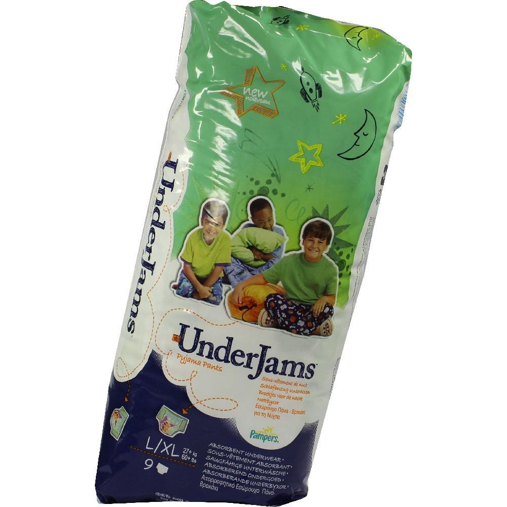 Packung mit grünen Schlafunterhosen für Kinder, mit drei lächelnden Kindern darauf.